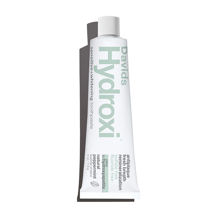 Tube of David's Hydroxi toothpaste on a white background