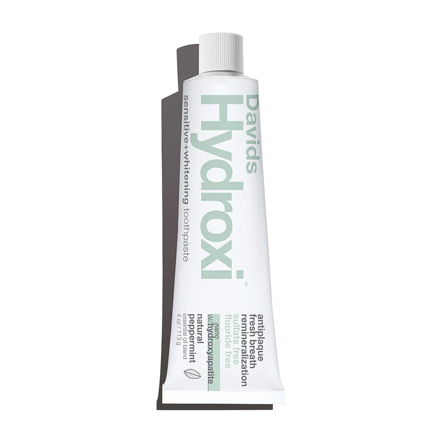 Tube of David's Hydroxi toothpaste on a white background