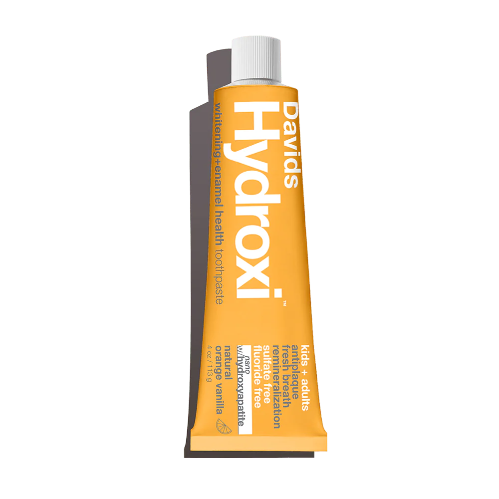 Tube of Davids Hydroxi toothpaste on a white background