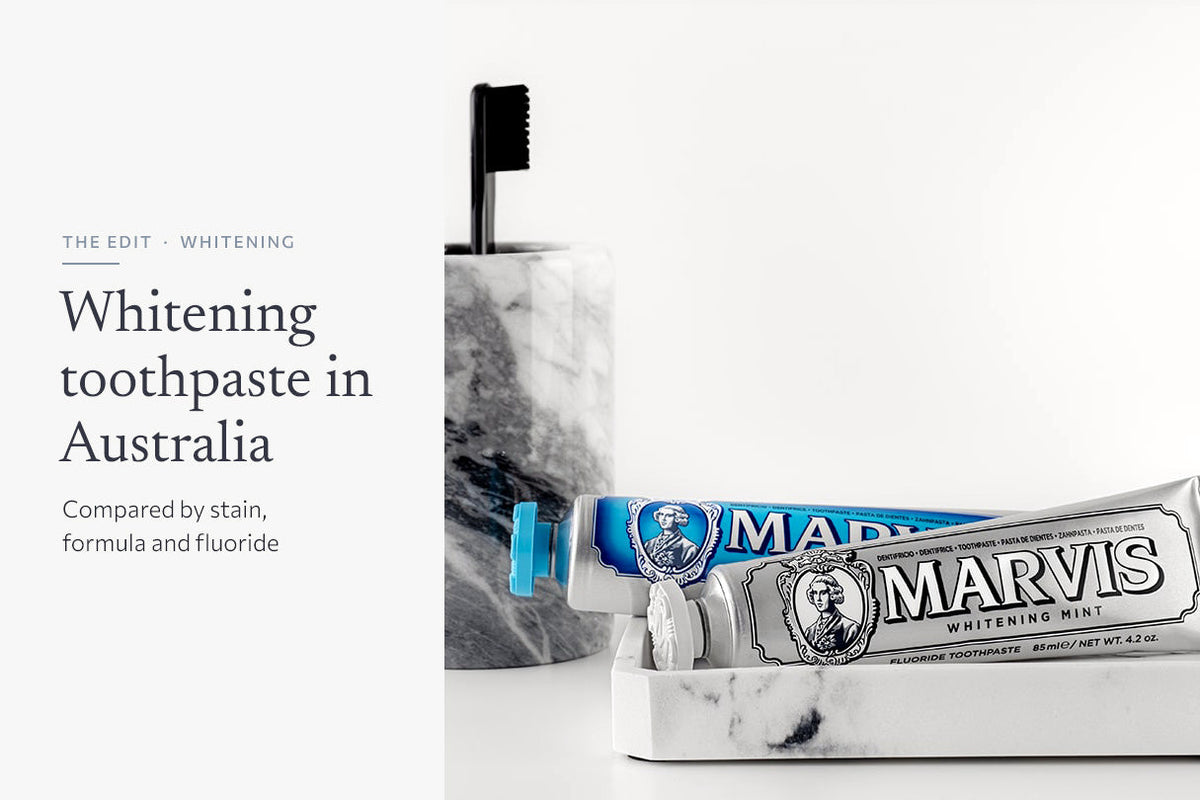 Marvis Whitening Mint and Aquatic Mint toothpaste on a white marble tray beside a marble toothbrush cup, with the headline Whitening toothpaste in Australia