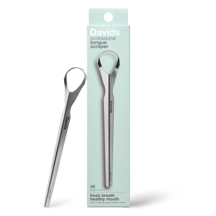 Davids professional tongue scraper in medical-grade stainless steel beside its retail box