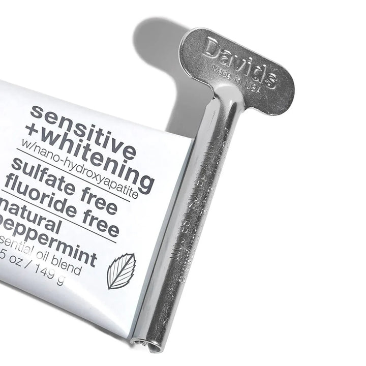 Davids metal tube key squeezer rolling up a Davids toothpaste tube, &