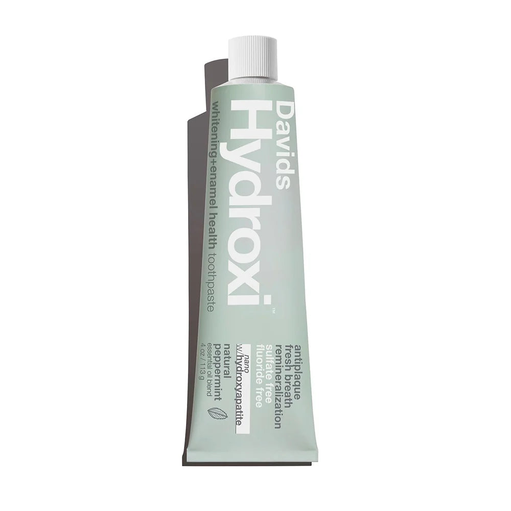 Tube of David's Hydroxi toothpaste on a white background