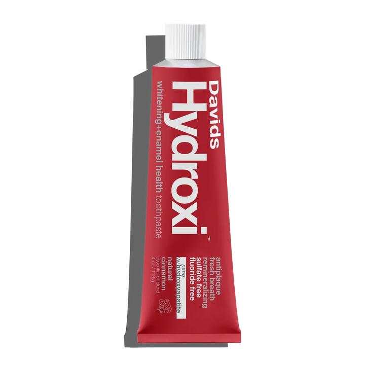 Davids Hydroxi cinnamon nano-hydroxyapatite toothpaste in a red recyclable metal tube — front, 113 g