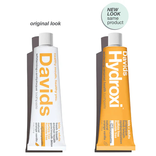 Two toothpaste tubes labeled 'Davids' and 'Hydroxi' side by side with text indicating a 'new look, same product' comparison.