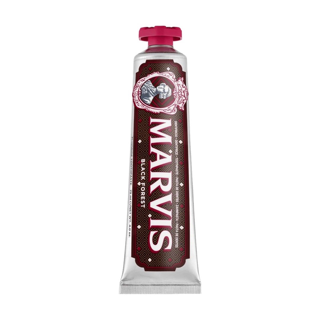 Marvis Black Forest 75ml tube standing cap up, silver with a dark brown diamond pattern label, a cameo portrait and a crimson cap