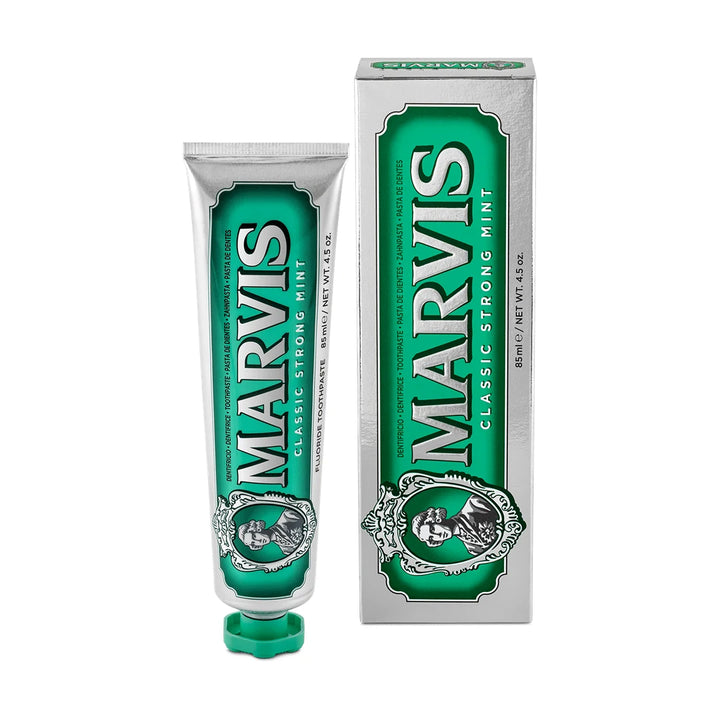 Marvis Classic Strong Mint toothpaste 85ml: silver tube, green label and green cap, standing beside its silver and green carton