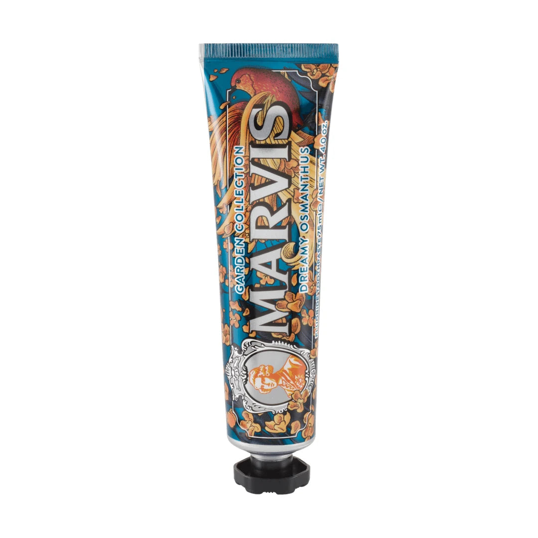 Upright Marvis Dreamy Osmanthus Garden Collection tube in deep teal with orange osmanthus flowers, silver lettering and a black cap
