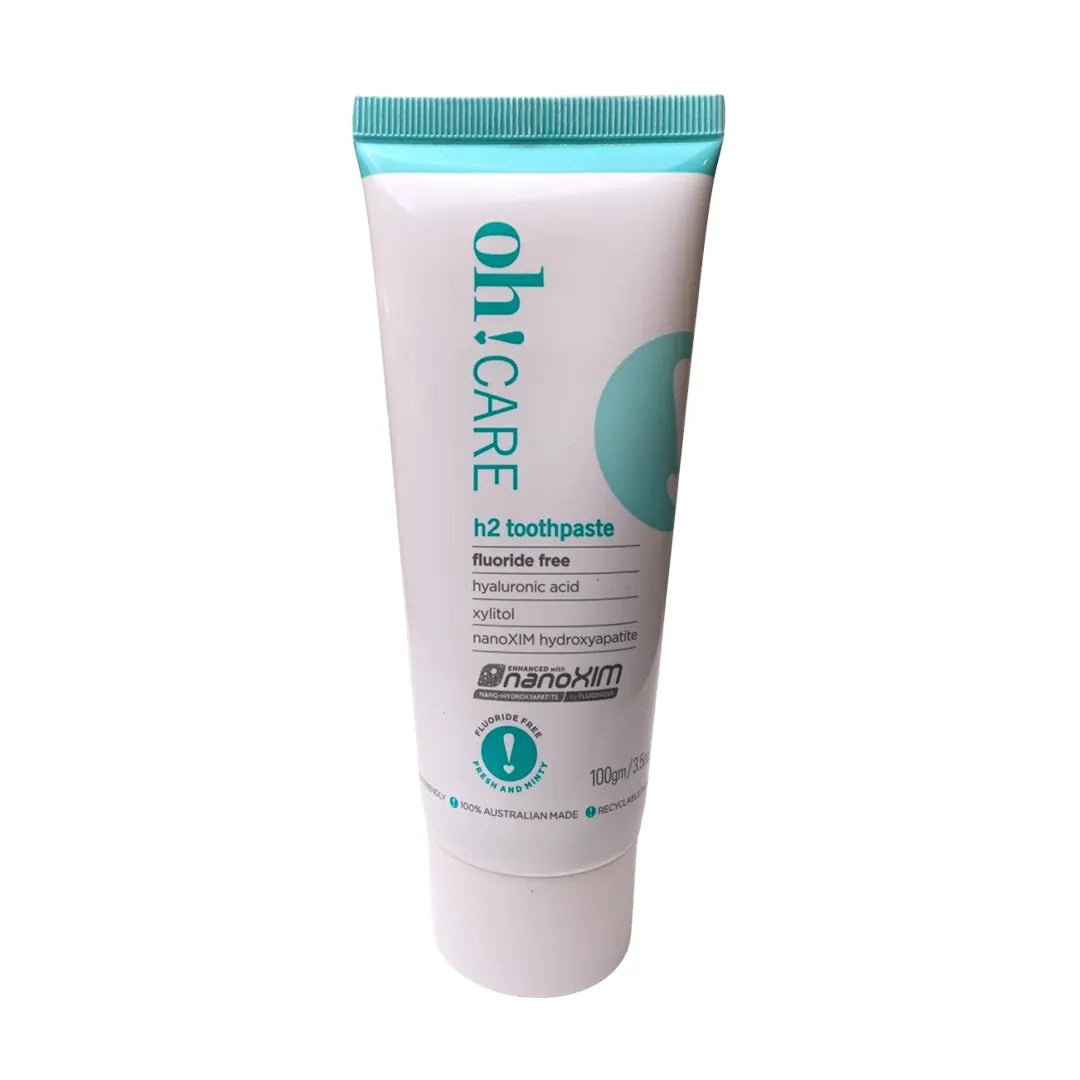 Oh Care h2 toothpaste 100g tube with a teal cap, labelled fluoride free with hyaluronic acid, xylitol and nanoXIM hydroxyapatite, on a white background