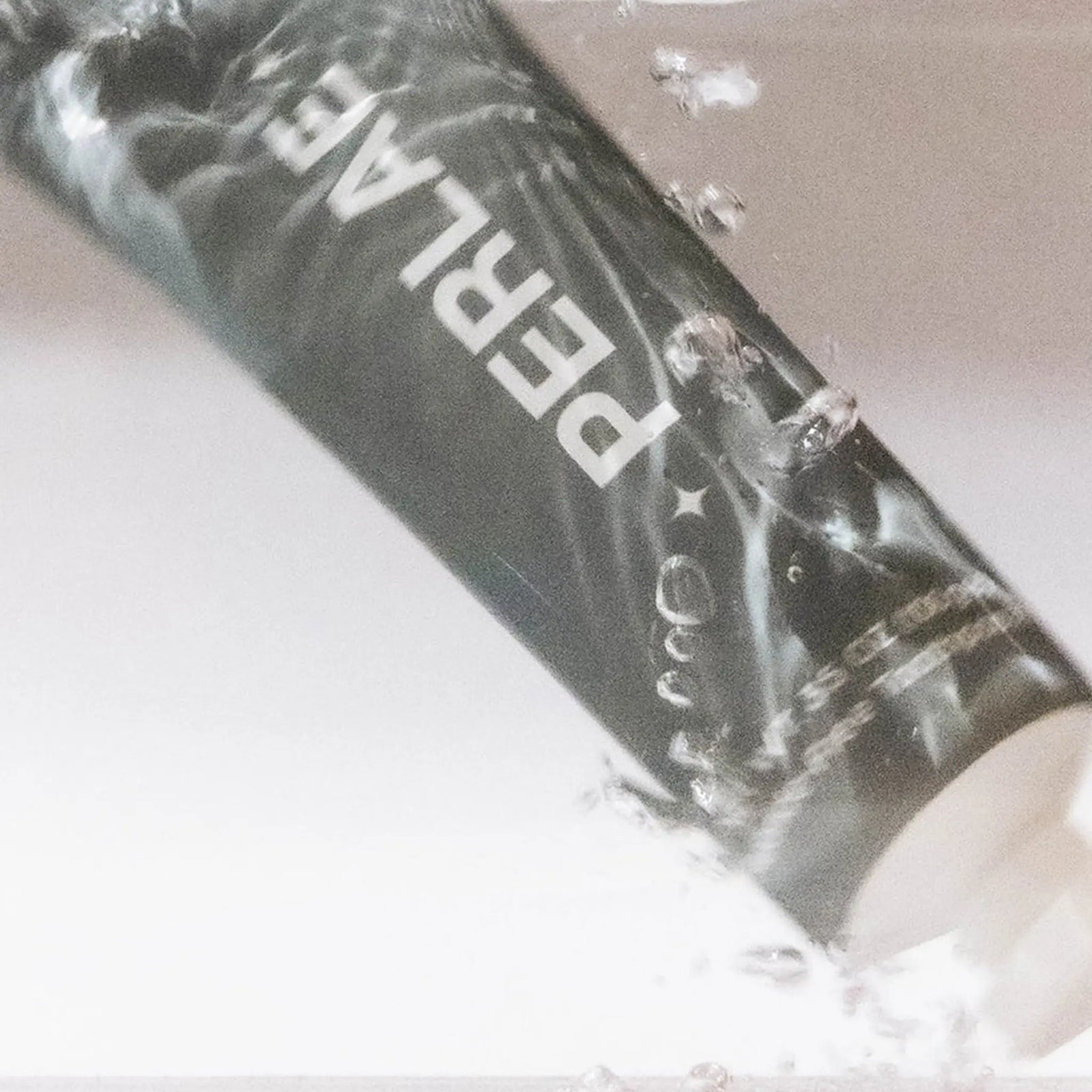 Perlae Opal Whitening Toothpaste lifestyle shot — citrus cardamom mint natural toothpaste