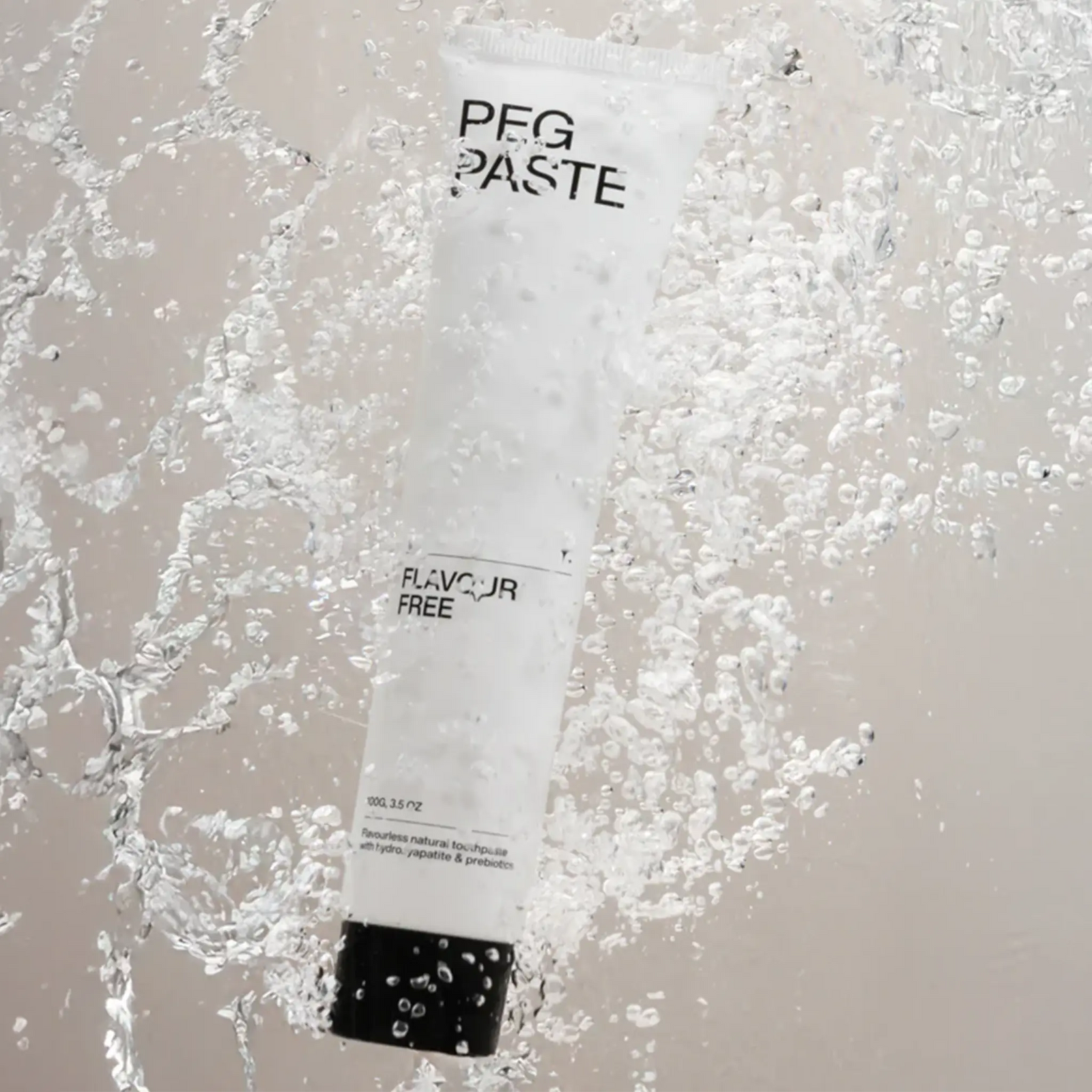 Tube of 'PEG PASTE' on a textured surface