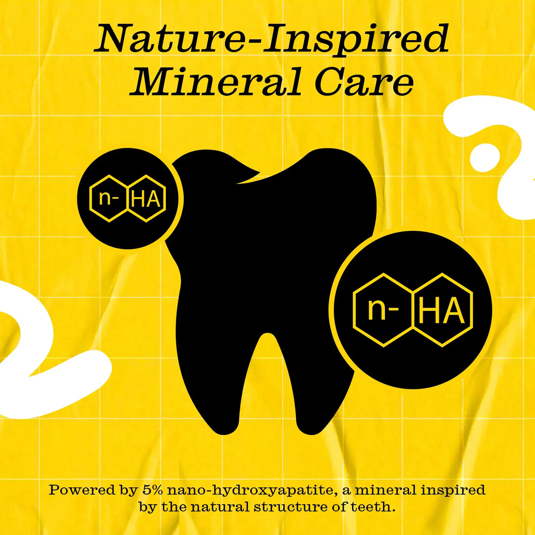 Twice Happy Mint toothpaste with white nano-hydroxyapatite paste squeezed onto a soft-bristle toothbrush